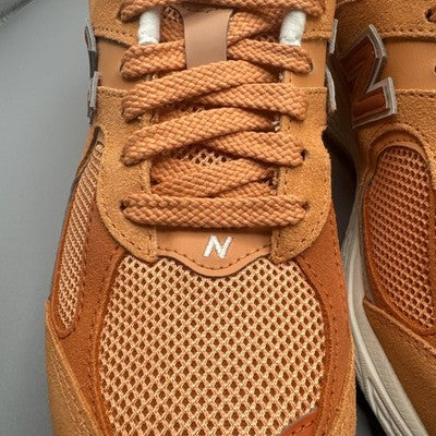 Size 11--New Balance 2002R Copper Infield Clay