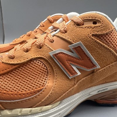 Size 10-- New Balance 2002R Copper Infield Clay